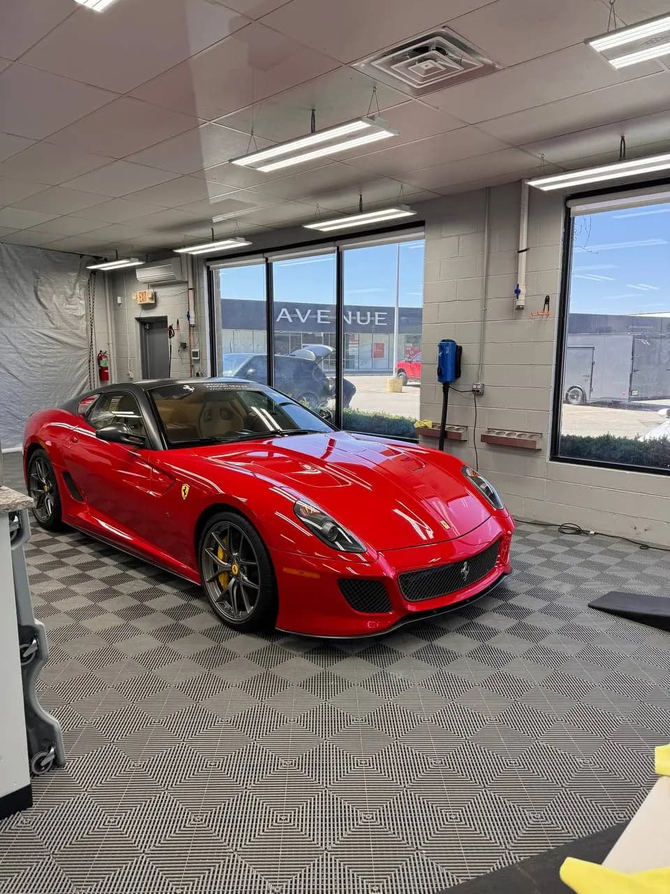 Red Ferrari 599 GTO on the shop floor