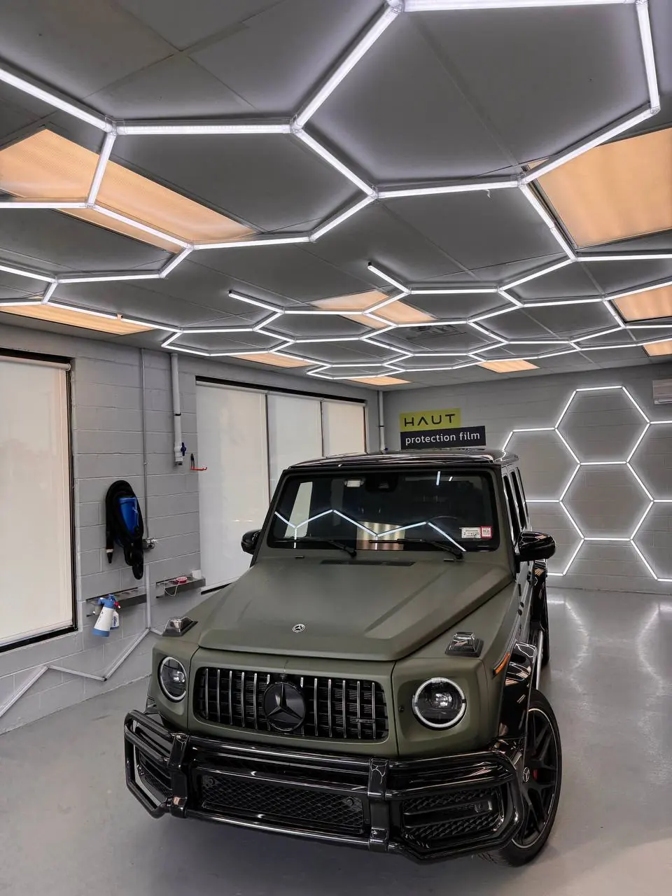 Matte green Mercedes-AMG G 63 in the install bay