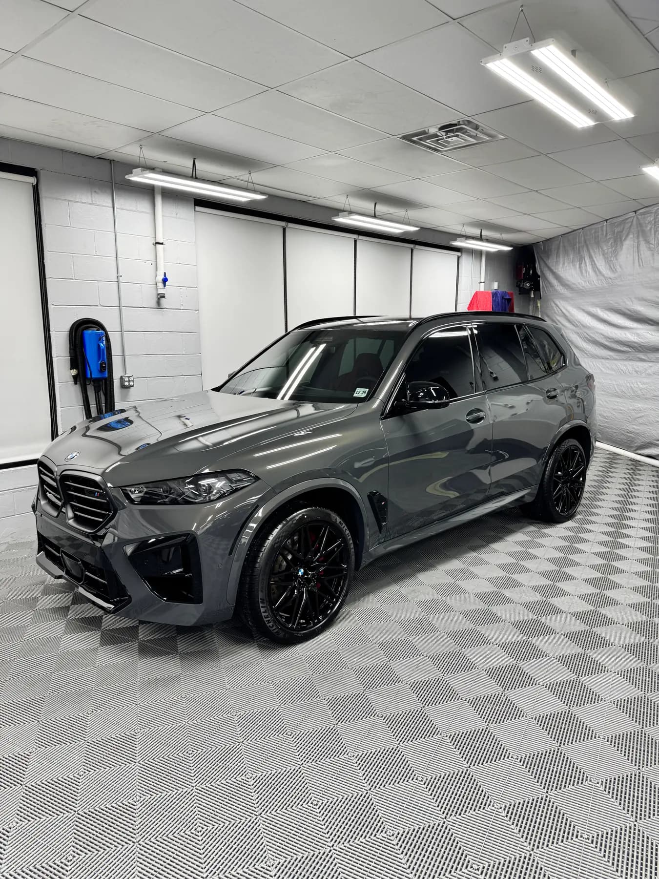 Grey BMW X7 in the install bay