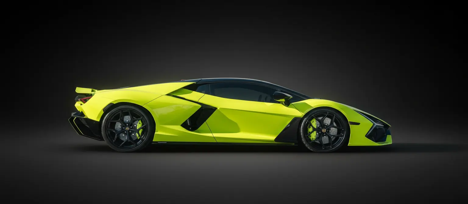 Lamborghini Revuelto finished in HAUT lime, lit against a black studio backdrop